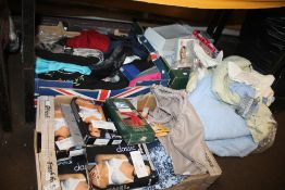 A QUANTITY OF NEW LADIES BRAS, CLOTHING ETC