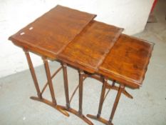 A WALNUT EDWARDIAN STYLE NEST OF TABLES