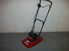 AN ALLEN PETROL HOVVER MOWER