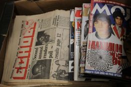 A BOX OF NEWSPAPERS AND MAGAZINES