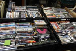 FOUR TRAYS OF CDS AND DVDS, PC GAMES ETC.