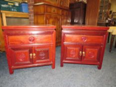 A PAIR OF HARDWOOD CHINESE STYLE LOW CABINETS H 51 CM, W 51 CM (2)