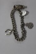 A VINTAGE HALLMARKED SILVER CHARM BRACELET APPROX WEIGHT - 35.5G