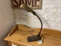 A 1920S COPPER ADJUSTING DESK LAMP WITH SHELL SHAPED WHITE METAL SHADE