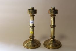 A PAIR OF 'SHERWOOD OF BIRMINGHAM' BRASS CANDLE STICKS, H 26 CM