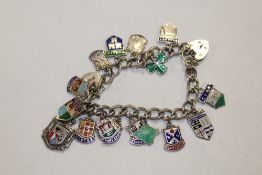 A SILVER AND ENAMEL CHARM BRACELET APPROX WEIGHT 42.2G