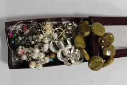 A SMALL BOX OF COSTUME JEWELLERY