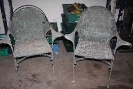 TWO METAL FRAMED WICKER CHAIRS - AS FOUND