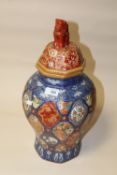 A LARGE MODERN CHINESE / ORIENTAL HAND PAINTED OCTAGONAL TEMPLE JAR WITH ORANGE BACKSTAMP, OVERALL H