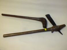 A SOUTH AFRICAN TRIBAL CLUB AND A LARGE AXE (2)