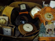 A BOX OF CLOCK PARTS FOR SPARES AND REPAIRS