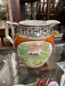 A GOOD EXAMPLE OF A LATE 18TH CENTURY STAFFORDSHIRE POTTERY JUG, depicting a dandy in yellow knee br