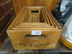 A SET OF FIVE HARRY POTTER HOGWARTS GRADUATED WOODEN POTION BOXES