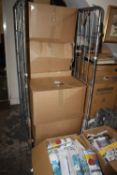 A CAGE OF EIGHT BOXES OF ASSORTED WHOLESALE GOODS TO INCLUDE BALLOONS, HEADBANDS ETC (CAGE NOT