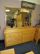 A MODERN LIGHT OAK SIX DRAWER CHEST, H-75 W-149 CM WITH A MODERN LARGE MIRROR (2)