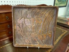 A JAPANESE RECTANGULAR CARVED SYCAMORE TRAY WITH IRISES - REPUTABLY RETAILED BY LIBERTY'S