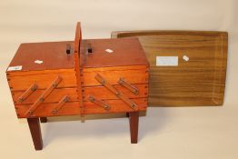A WOODEN FOLD OUT SEWING BOX TOGETHER WITH A WOODEN SERVING TRAY