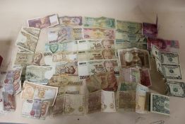 A LARGE QUANTITY OF WORLD BANKNOTES TO INCLUDE TURKISH AND AMERICAN EXAMPLES
