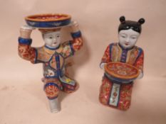 TWO MODERN CHINESE/ ORIENTAL HAND PAINTED FIGURES HOLDING BOWLS WITH ORANGE BACK STAMPS TALLEST