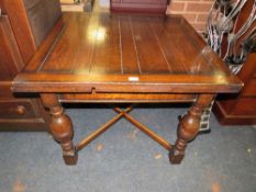 AN OAK DRAWLEAF TABLE