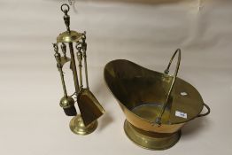 A BRASS COAL BUCKET AND COMPANION SET