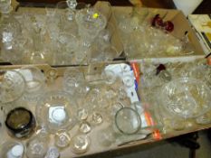 FOUR TRAYS OF MOSTLY CUT GLASS TO INCLUDE DECANTERS AND DRINKING GLASSES, SOME STEWART CRYSTAL