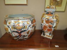 A LARGE MODERN EASTERN CERAMIC JARDINAIRE H-31 CM WITH A MATCHED TEMPLE JAR AND COVER H-47 CM (2)