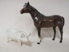 A BESWICK PIG FIGURE 'WALL QUEEN' TOGETHER WITH A BESWICK HORSE (CHIPPED EARS)