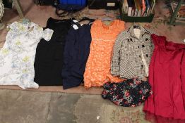 A BAG OF LADIES CLOTHING