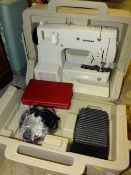 A CASED BERMINA 801 ELECTRIC SEWING MACHINE