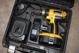 A CASED DEWALT DRILL
