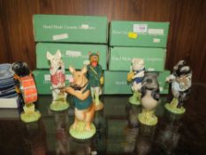 A SET OF SIX BESWICK PIG BAND FIGURES WITH BOXES, TOGETHER WITH A BESWICK HUNTING FOX (7)