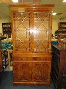 A REPRODUCTION YEW WOOD DISPLAY BOOKCASE, H 184 CM, W 91 CM