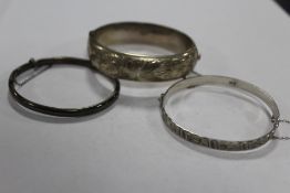 THREE HALLMARKED SILVER BANGLES APPROX COMBINED WEIGHT 44.3G