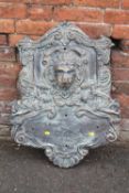 A LARGE METAL LION HEAD AND FIGURAL FOUNTAIN PLAQUE -80 CM W-60 CM