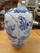 A MODERN BLUE AND WHITE ORIENTAL TEMPLE JAR AND COVER WITH CHARACTER MARK TO BASE H-36 CM