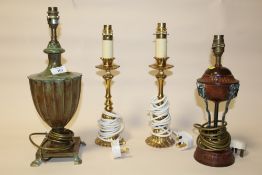 A PAIR OF GILT METAL TABLE LAMPS TOGETHER WITH TWO OTHER BRONZE EFFECT EXAMPLES (4)