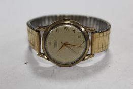 A VINTAGE 9 CARAT GOLD CASED ROTARY MAXIMUS AUTOMATIC WRISTWATCH ON EXPANDABLE STRAP