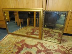 A MODERN RECTANGULAR GILT MIRROR 104 X 73 CM AND A SMALLER MIRROR (2)