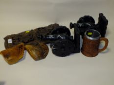 A BLACK FOREST CARVED BOOK SLIDE, A PAIR OF WOODEN MODEL CANONS, TWO EASTERN EUROPEAN JUGS AND A