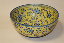 A MODERN CHINESE / ORIENTAL BLUE AND YELLOW FLORAL BOWL WITH ORANGE BACK STAMP, DIA. 30.5 CM