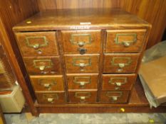 A VINTAGE OAK TWELVE INDEX DRAWS W 50 CM, H 42.5, CM, D 40 CM