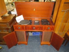 A DYNATRON SRX 20 MUSIC CENTRE IN A MAHOGANY CABINET W-98 CM
