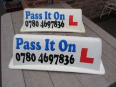 A PAIR OF VINTAGE MAGNETIC DRIVING INSTRUCTOR CAR ROOF ADVERTISING SIGNS (a magnet is missing on one