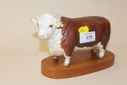 A BESWICK MATT FINISH HEREFORD BULL FIGURE WITH PLINTH