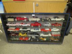 A GLASS WALL HANGING DISPLAY CASE, CONTAINING DIE CAST CARS, CABINET H 57 CM, W 106 CM