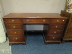 A REPRODUCTION MAHOGANY TWIN PEDESTAL DESK H-77 W-138 CM