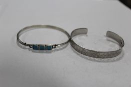 TWO STERLING SILVER BANGLES TO INCLUDE A TURQUOISE EXAMPLE APPROX WEIGHT 20.6G