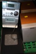 A SONY STEREO TOGETHER WITH A ROBERTS CLOCK RADIO