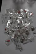 A LARGE QUANTITY OF PACKAGED SILVER CHARMS (50)
